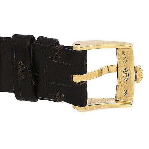 This image shows a close-up side view of the black leather strap and gold buckle of a Rolex Cellini 5112 Yellow Gold Champagne Dial 5112 Yellow Gold Champagne Dial watch.