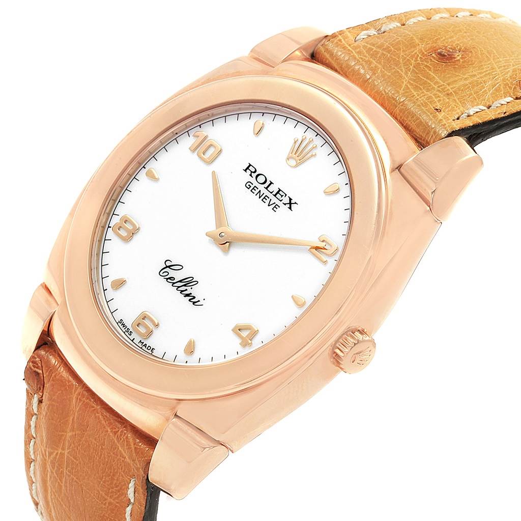 The image shows a Rolex Cellini 5330 Men
s Rose Gold White Dial 5330 Men
s Rose Gold White Dial watch angled to the right, highlighting its face, crown, and leather strap.