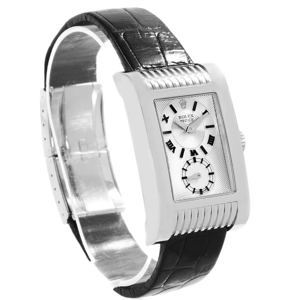 The image shows a Rolex Cellini 5441 Men
s White Gold Silver Dial 5441 Men
s White Gold Silver Dial watch at an angled side view, highlighting the black leather strap and rectangular dial.