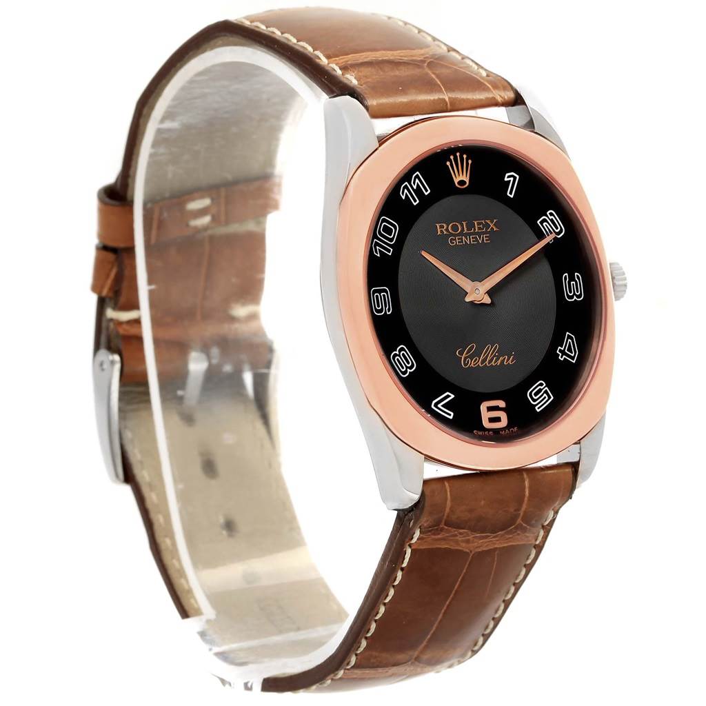 The Rolex Cellini 4233 Men's White Gold Black Dial 4233 Men's White Gold Black Dial watch is shown at a slight angle, displaying its black dial, rose gold bezel, and brown leather strap.
