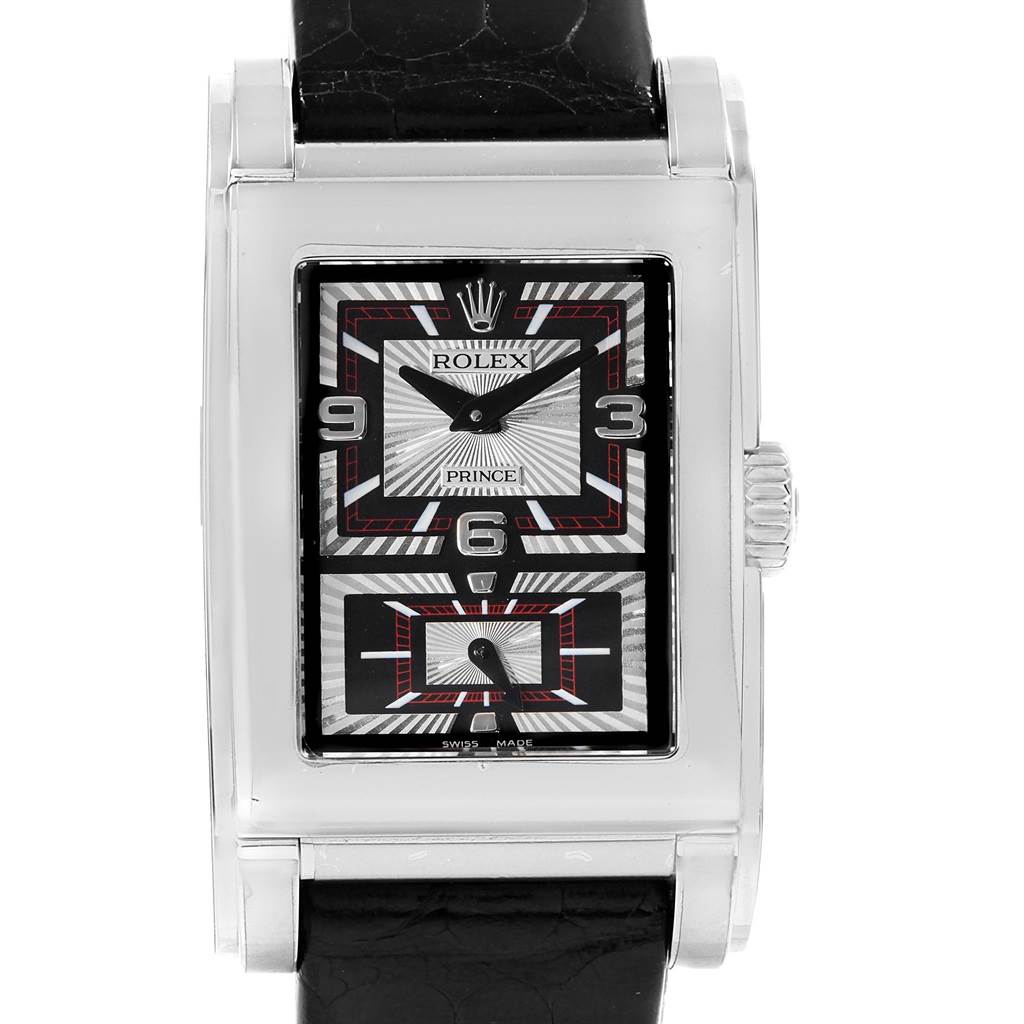 The image shows a front view of a Rolex Cellini 5443/9 Men
s White Gold Black Dial 5443/9 Men
s White Gold Black Dial Prince watch, highlighting its dial, crown, and black leather strap.