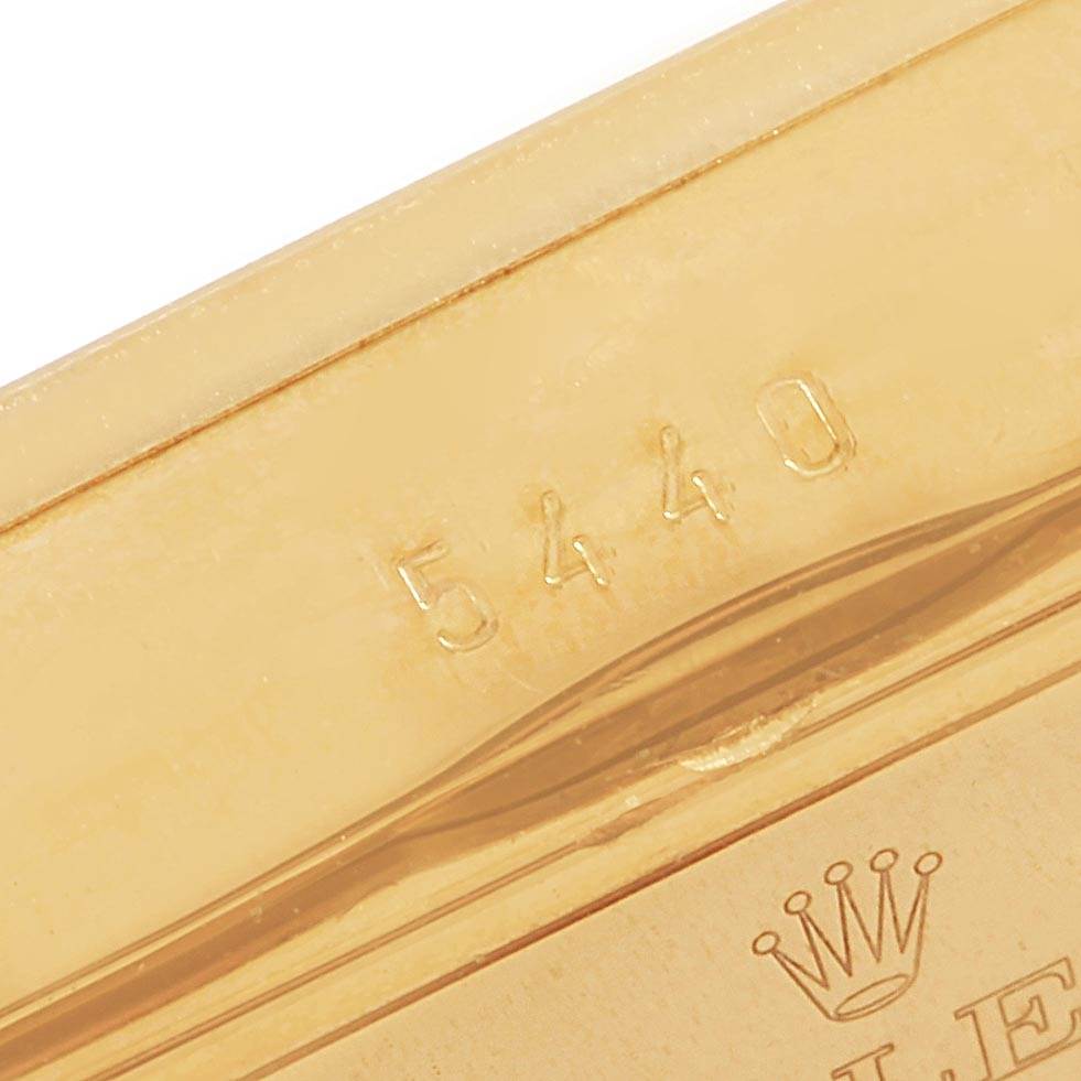 This image shows a close-up of the serial number and brand logo on the case or a component of a Rolex Cellini 5440/8 Men's Yellow Gold Champagne Dial 5440/8 Men's Yellow Gold Champagne Dial watch.