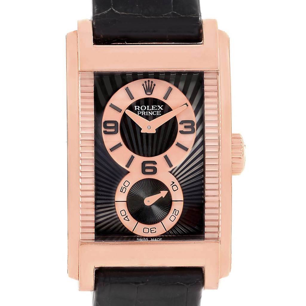 The Rolex Cellini 5442/5 Men's Rose Gold Black Dial 5442/5 Men's Rose Gold Black Dial model watch is shown from a front view, displaying its rectangular face, black leather strap, and dual sub-dials.