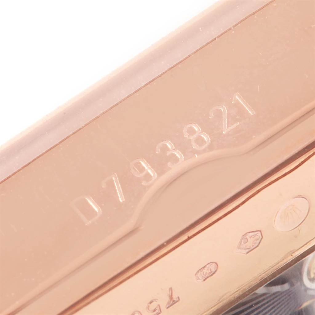 This image shows a close-up of the case back edge of a Rolex Cellini 5442/5 Men's Rose Gold Black Dial 5442/5 Men's Rose Gold Black Dial watch, displaying its engraved serial number.