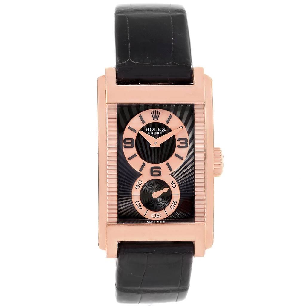 The Rolex Cellini 5442/5 Men's Rose Gold Black Dial 5442/5 Men's Rose Gold Black Dial watch is shown from a top-down angle, displaying its rectangular face, rose gold case, and black leather strap.