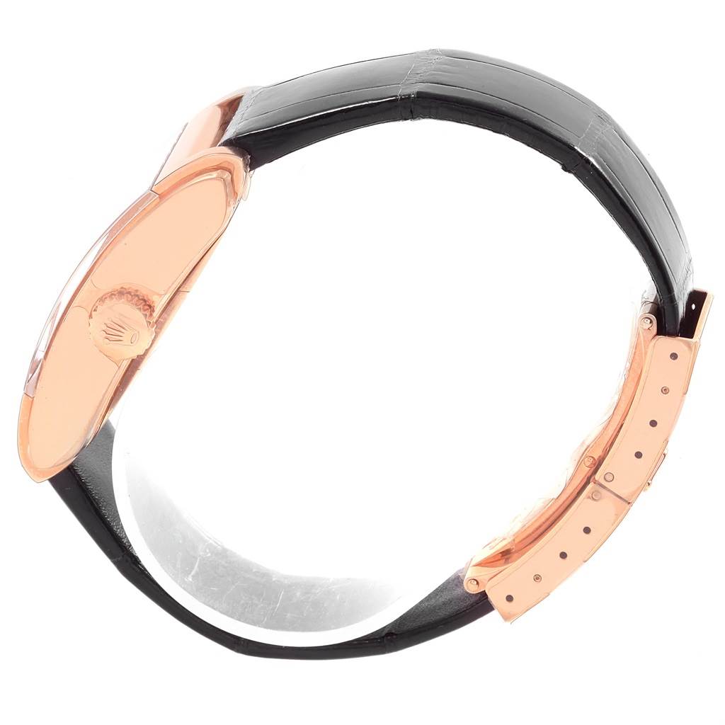 The image shows a side view of the Rolex Cellini 5442/5 Men's Rose Gold Black Dial 5442/5 Men's Rose Gold Black Dial watch, highlighting its black leather strap and rose gold case.