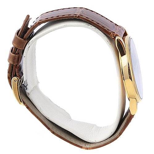 This image shows a side angle view of a Rolex Cellini 5116 Men's Yellow Gold Grey Dial 5116 Men's Yellow Gold Grey Dial watch, highlighting the leather strap and gold case.