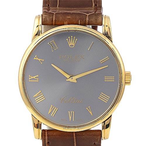 This image shows a Rolex Cellini 5116 Men's Yellow Gold Grey Dial 5116 Men's Yellow Gold Grey Dial watch with a gold case, brown leather strap, and gray dial featuring Roman numeral hour markers.