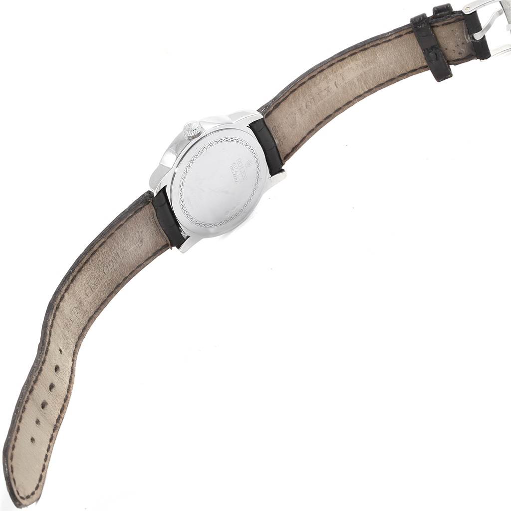 This image shows the back of a Rolex Cellini 5240 Men's Platinum Mother of Pearl Dial 5240 Men's Platinum Mother of Pearl Dial watch, displaying the case back and leather strap from a top-down angle.