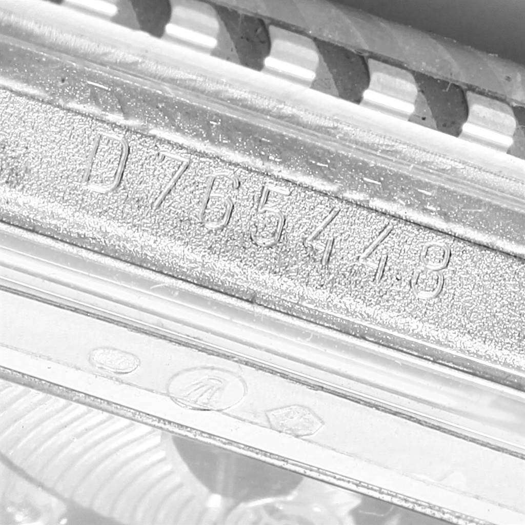 The image shows a close-up of the serial number engraving on the case of a Rolex Cellini 5441/9 Men's White Gold Silver Dial 5441/9 Men's White Gold Silver Dial watch.