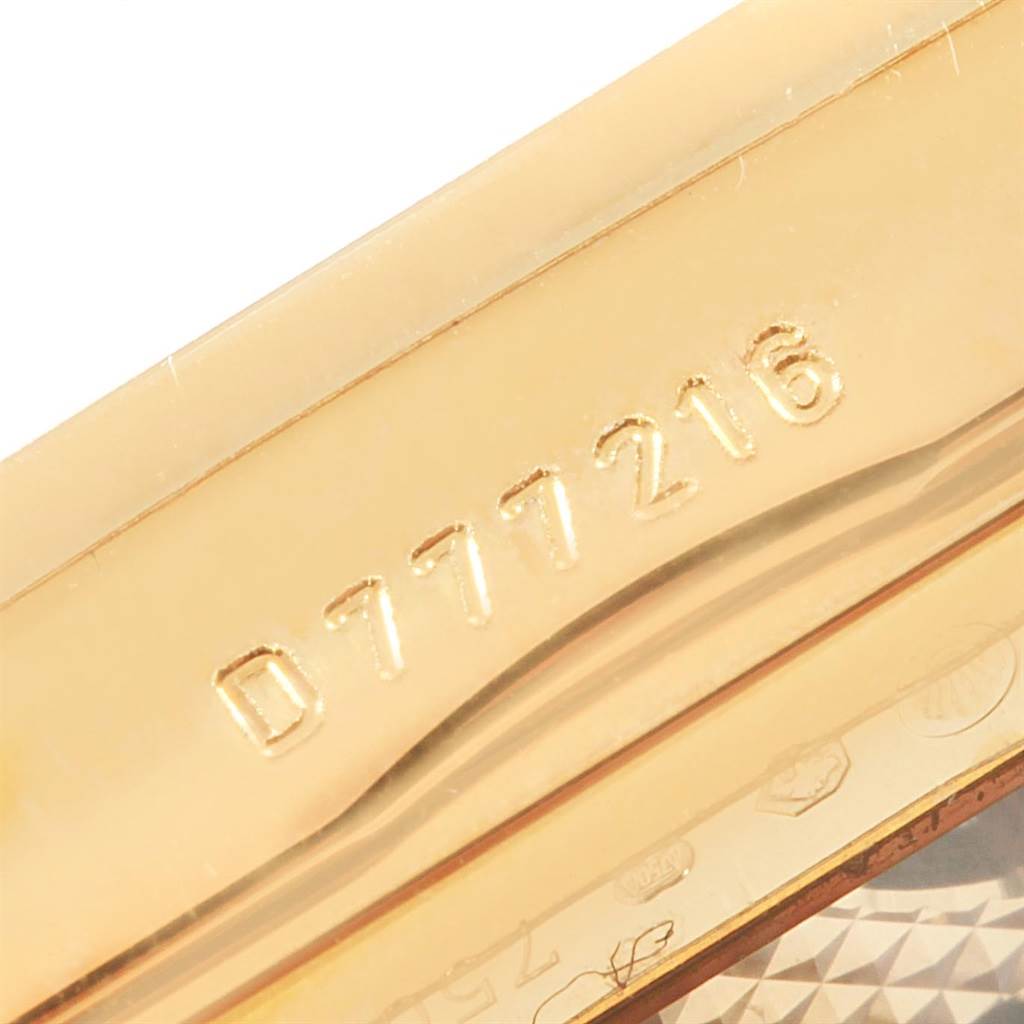 The image shows a close-up of the serial number on the case of a Rolex Cellini 5440/8 Men's Yellow Gold Champagne Dial 5440/8 Men's Yellow Gold Champagne Dial watch.