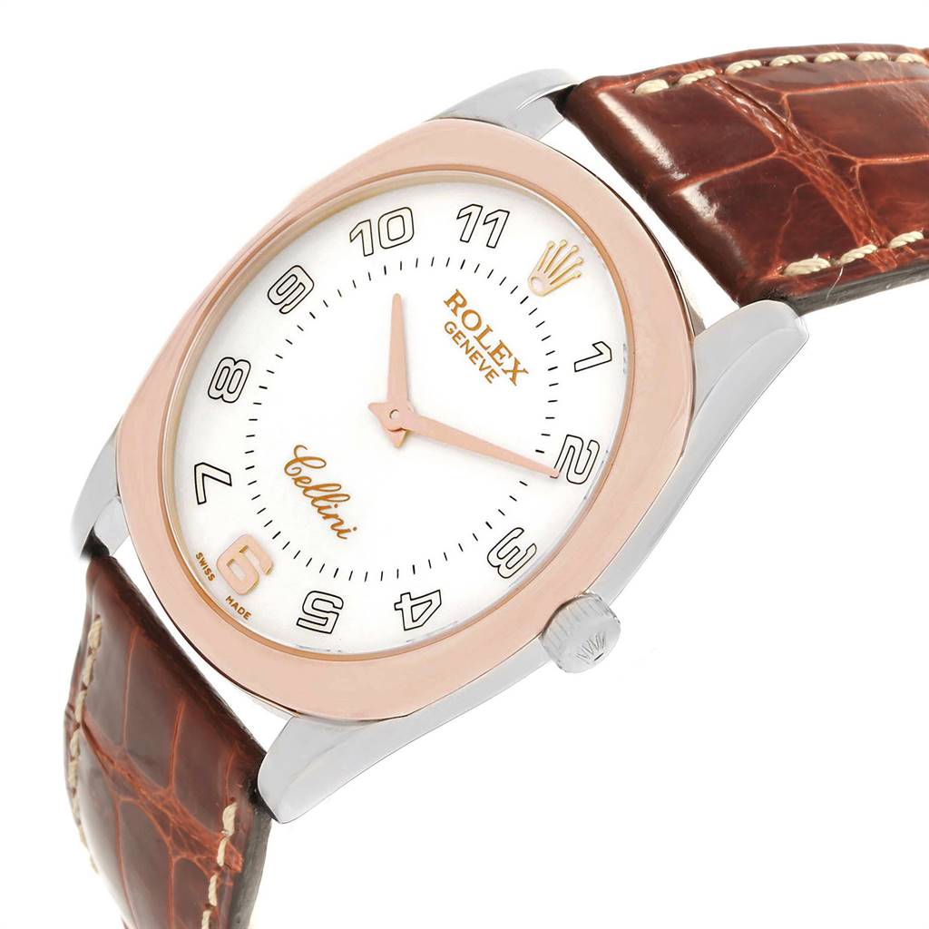 The image shows a Rolex Cellini 4233 Men
s White Gold White Dial 4233 Men
s White Gold White Dial watch at an angle highlighting its dial, hands, bezel, crown, and brown leather strap.