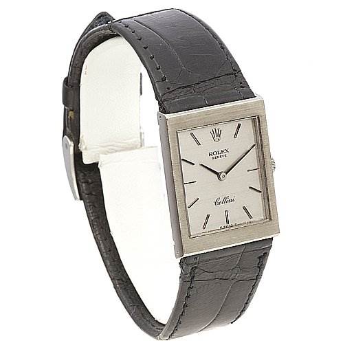 The image shows a Rolex Cellini 4014 White Gold Silver Dial 4014 White Gold Silver Dial watch from a side angle, highlighting its rectangular dial and black leather strap.