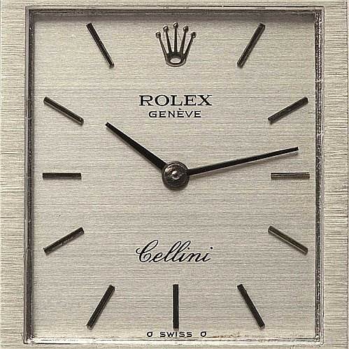 The image shows a close-up of the Rolex Cellini 4014 White Gold Silver Dial 4014 White Gold Silver Dial's watch face, featuring the brand name, model name, hour markers, and hands.