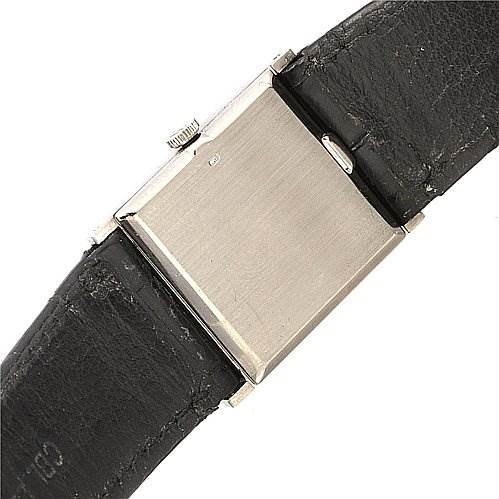 The image shows the back case and part of the leather strap of a Rolex Cellini 4014 White Gold Silver Dial 4014 White Gold Silver Dial watch.