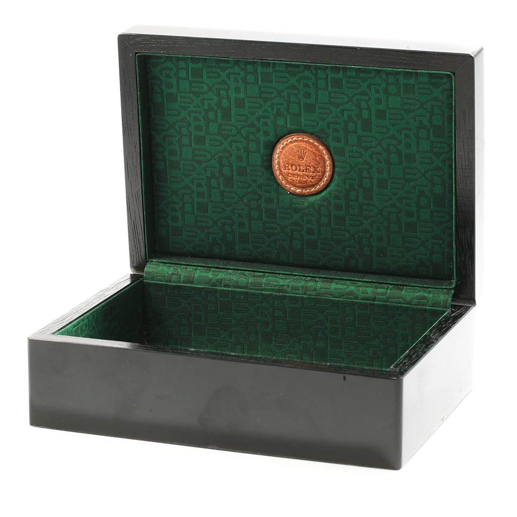 The image shows an open box for the Rolex Cellini 6633 Men's Yellow Gold Champagne Dial 6633 Men's Yellow Gold Champagne Dial watch, displaying its green interior and gold emblem.