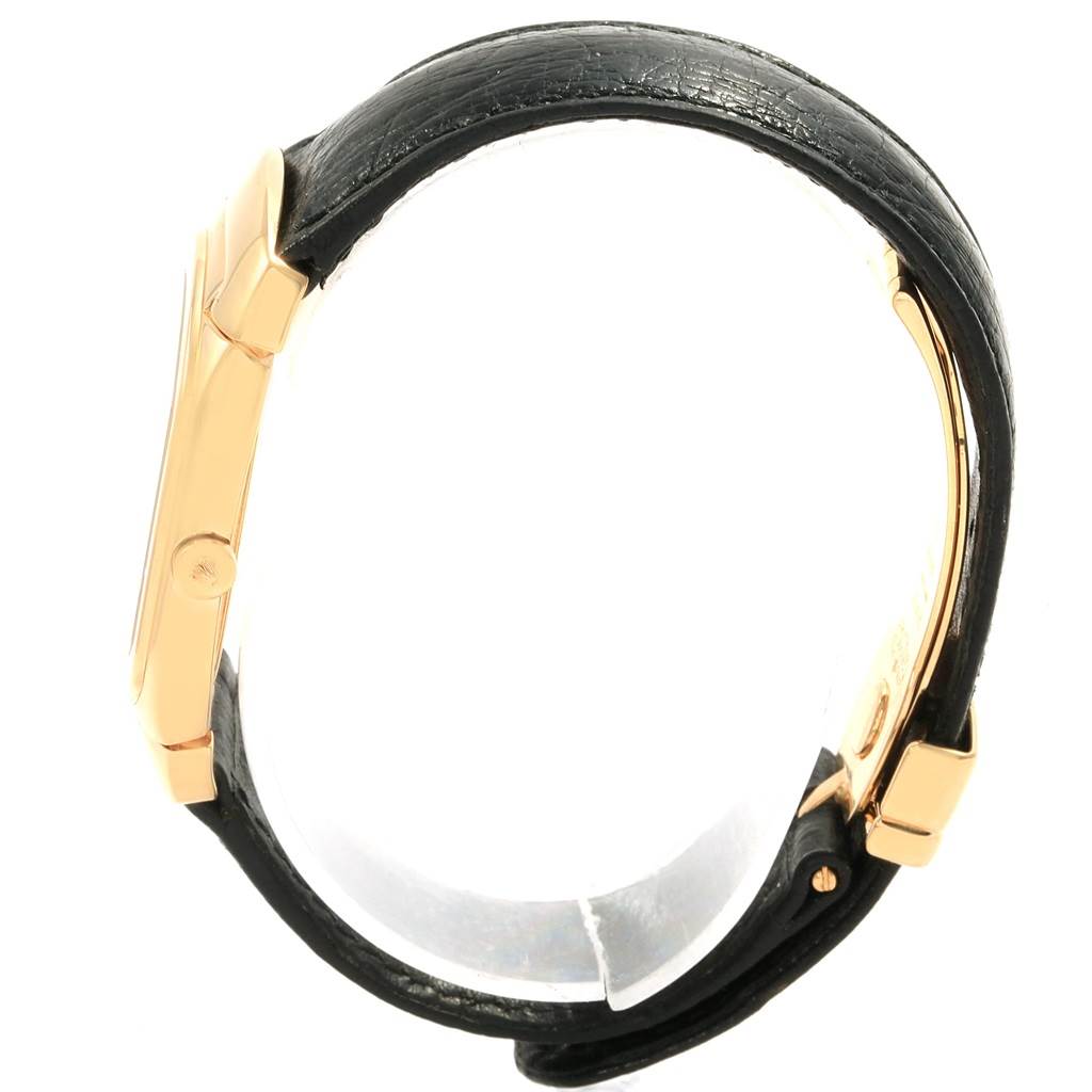 The image shows a side view of a Rolex Cellini 6633 Men's Yellow Gold Champagne Dial 6633 Men's Yellow Gold Champagne Dial watch, highlighting its case, buckle, and black leather strap.