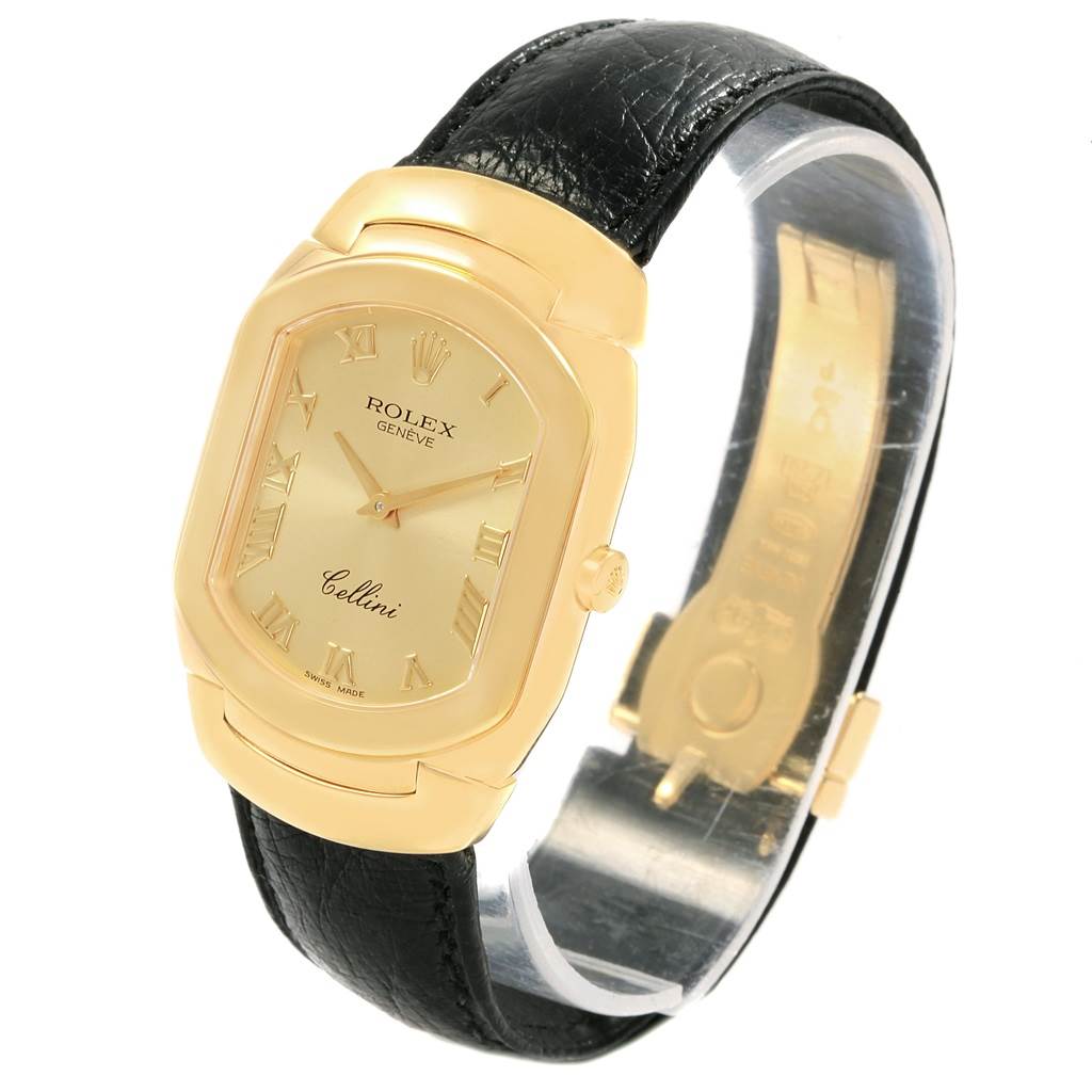 The image shows a Rolex Cellini 6633 Men's Yellow Gold Champagne Dial 6633 Men's Yellow Gold Champagne Dial watch from a slight side angle, highlighting its gold case, black leather strap, and dial.