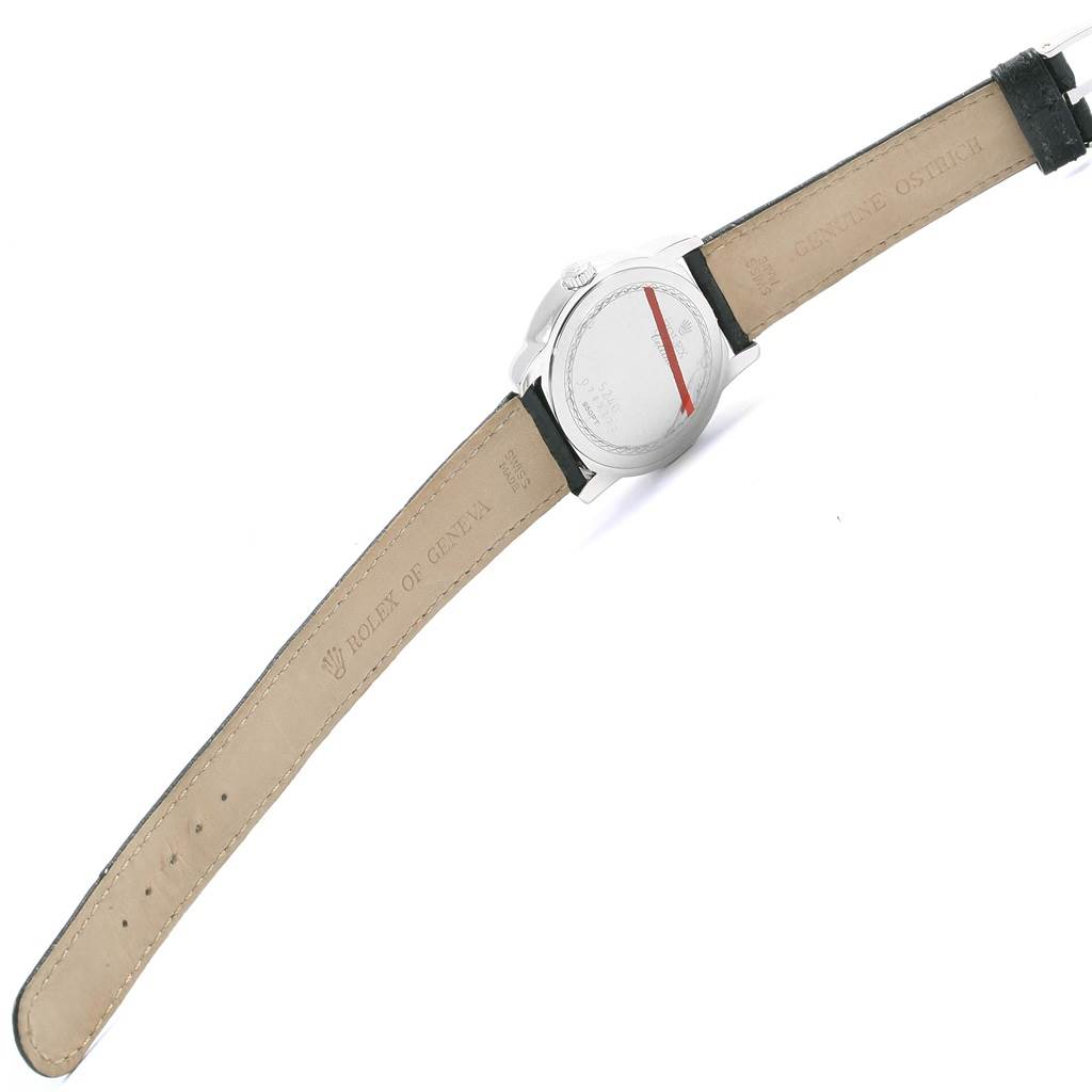 The Rolex Cellini 5240/9 Men's Platinum Mother of Pearl Dial 5240/9 Men's Platinum Mother of Pearl Dial watch is shown from the back, displaying the leather strap and the back of the watch case.