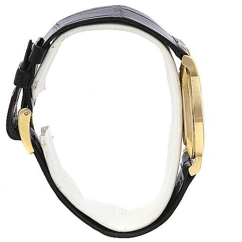 The image shows a side view of a Rolex Cellini 5112 Men's Yellow Gold White Dial 5112 Men's Yellow Gold White Dial watch, highlighting its strap, buckle, and case edge.