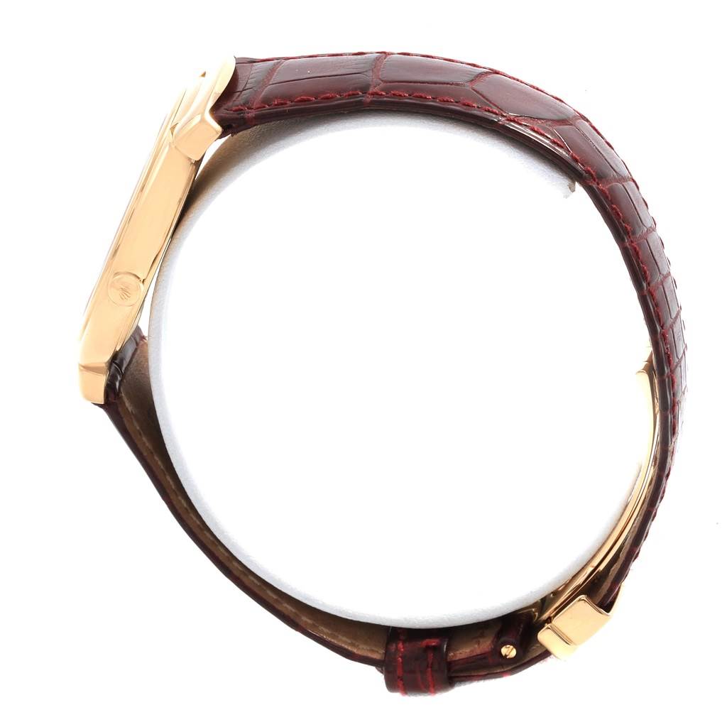 The image shows a side view of a Rolex Cellini 6623 Men's Yellow Gold White Dial 6623 Men's Yellow Gold White Dial watch, highlighting the watch case and leather strap with a gold buckle.