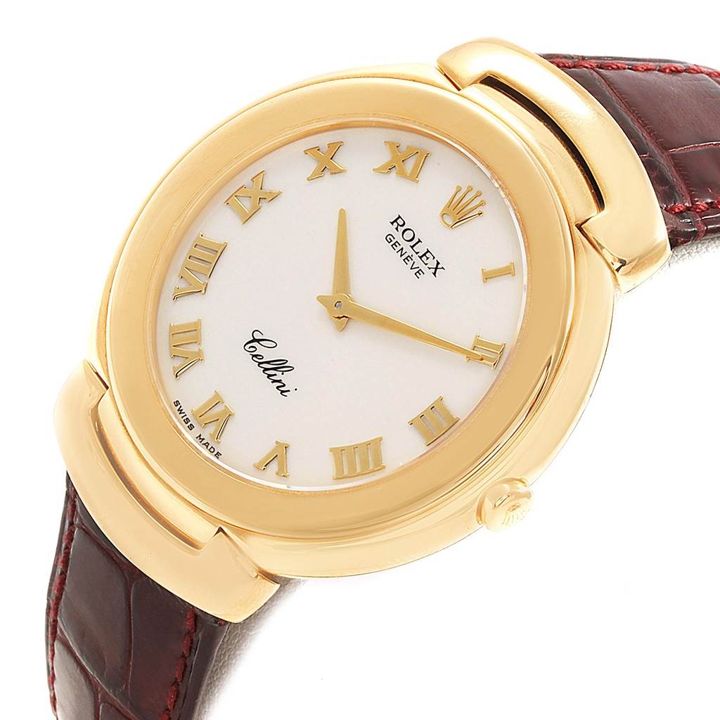 This image shows a close-up angled view of the Rolex Cellini 6623 Men's Yellow Gold White Dial 6623 Men's Yellow Gold White Dial watch, highlighting the gold case, white dial, and brown leather strap.