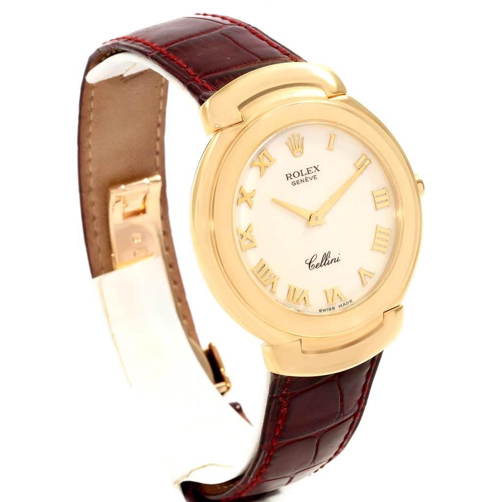 This image shows a Rolex Cellini 6623 Men's Yellow Gold White Dial 6623 Men's Yellow Gold White Dial model watch from an angled top-side view, highlighting its gold casing and brown leather strap.