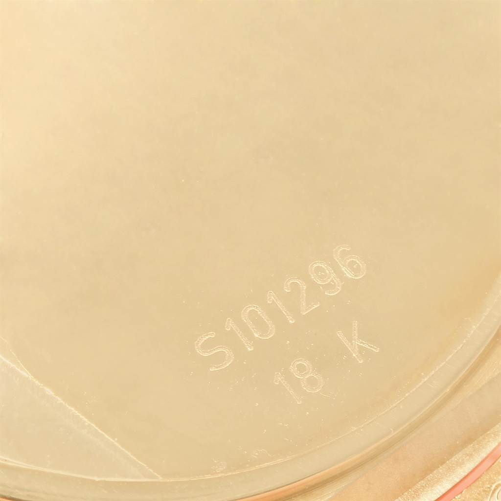 The image shows a close-up of the back case of a Rolex Cellini 6623 Men's Yellow Gold White Dial 6623 Men's Yellow Gold White Dial watch with its serial number and gold purity stamp.