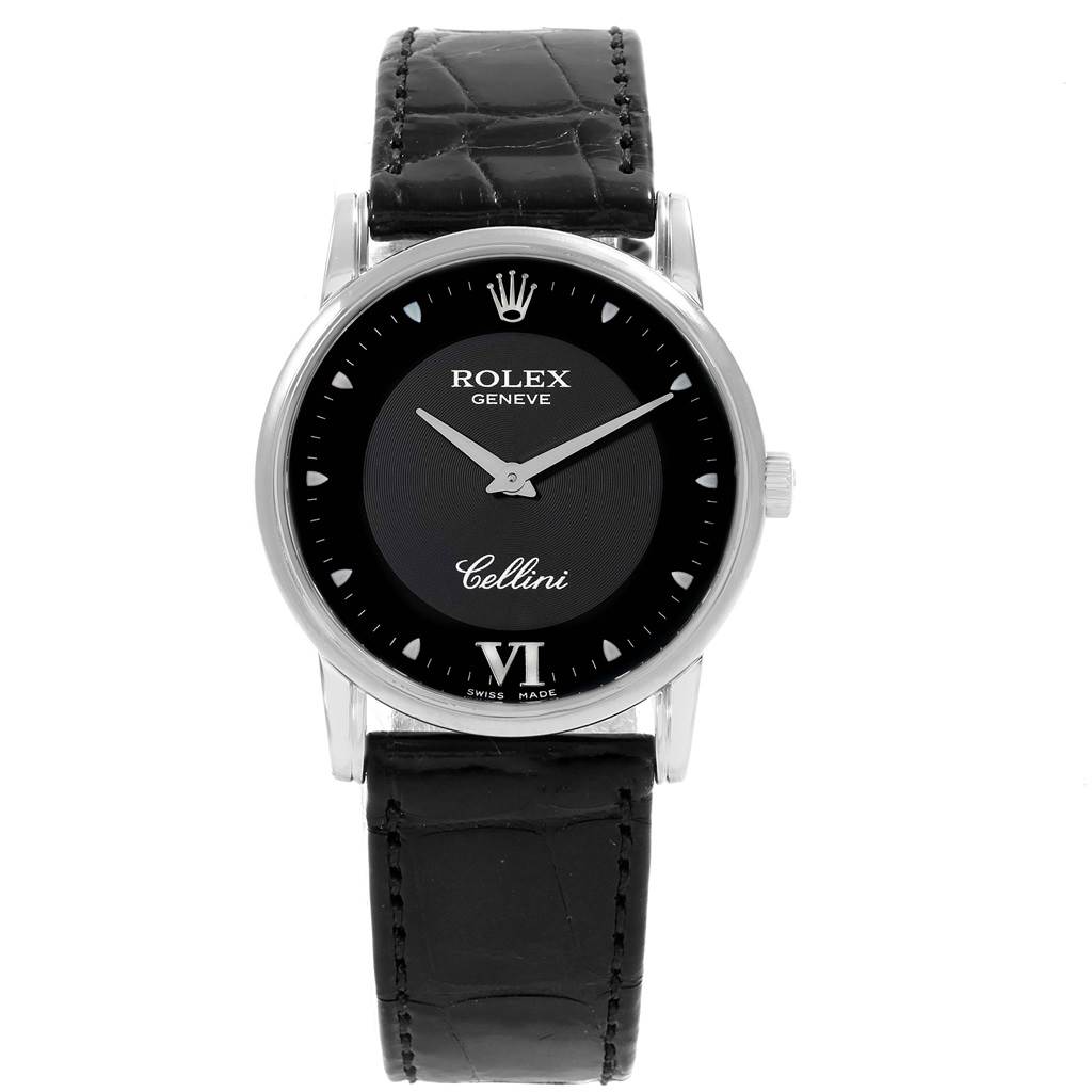 The image shows a frontal view of a Rolex Cellini 5116 Men's White Gold Black Dial 5116 Men's White Gold Black Dial watch, highlighting its black dial, silver hour markers, and black leather strap.