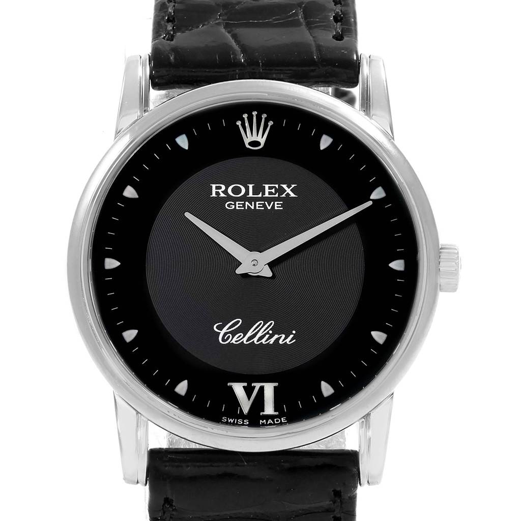 The image shows a frontal view of the Rolex Cellini 5116 Men's White Gold Black Dial 5116 Men's White Gold Black Dial watch, including the dial, bezel, crown, and part of the leather strap.