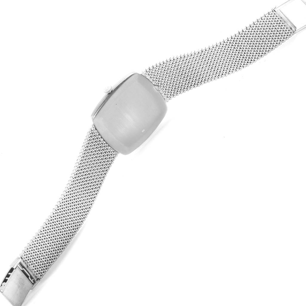 This image shows the mesh bracelet and side view of the casing of a Rolex Cellini 4086 Men's White Gold Silver Dial 4086 Men's White Gold Silver Dial watch.