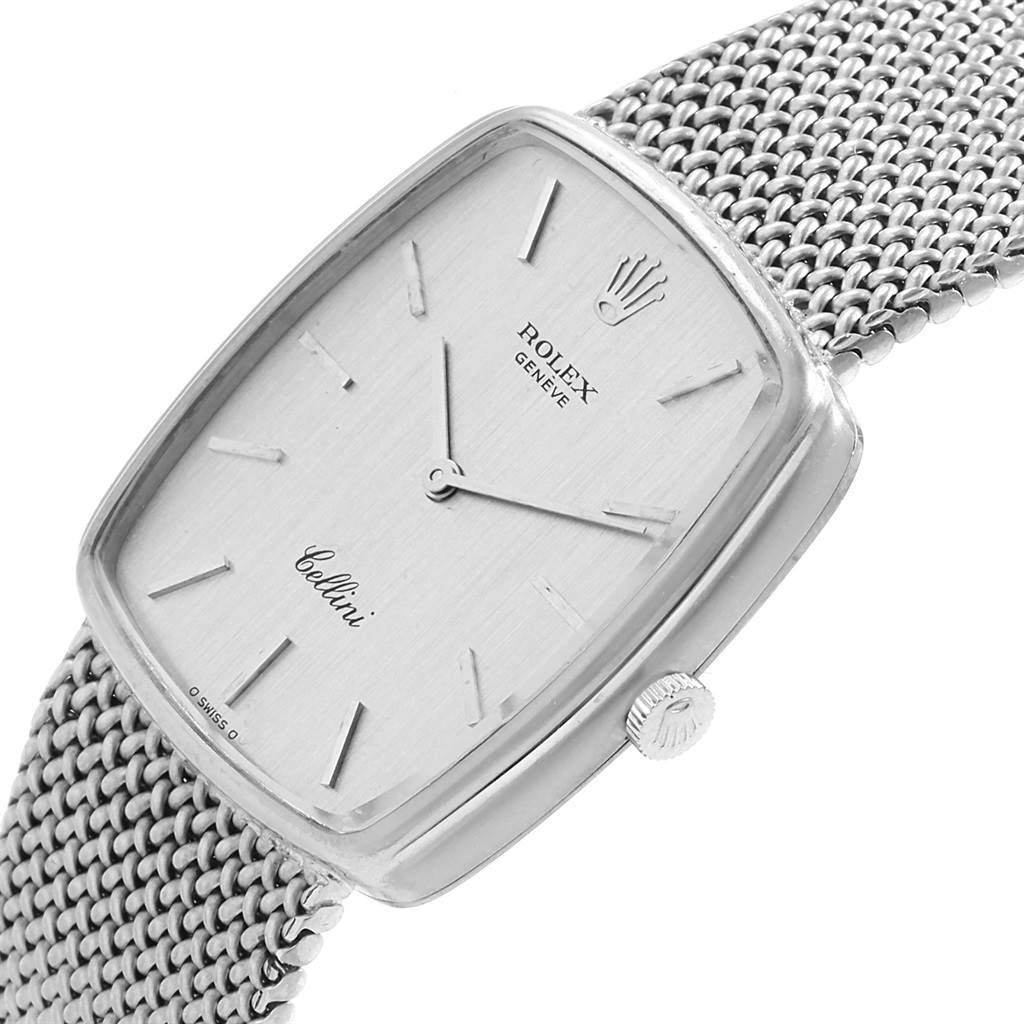 The image shows a close-up, angled view of a Rolex Cellini 4086 Men's White Gold Silver Dial 4086 Men's White Gold Silver Dial watch, highlighting its face, crown, and mesh band.