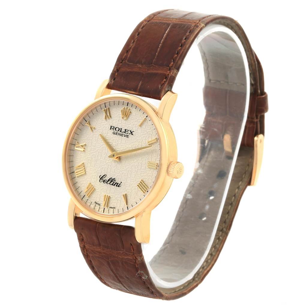 This image shows a Rolex Cellini 5115 Men's Beige Dial 5115 Men's Beige Dial watch at a three-quarter angle, highlighting its face, crown, and brown leather strap.