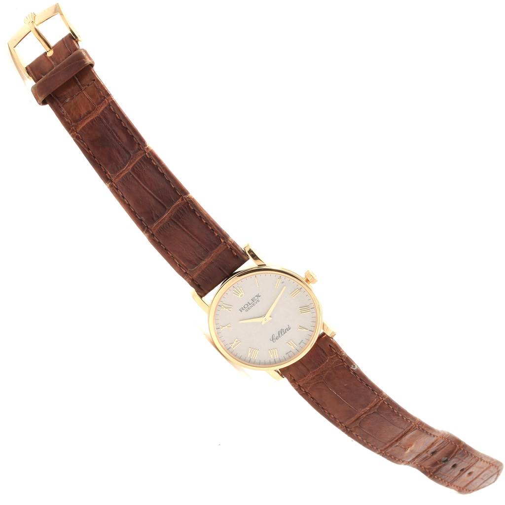 The image shows the front view of a Rolex Cellini 5115 Men's Beige Dial 5115 Men's Beige Dial watch with a brown leather strap and a gold case.