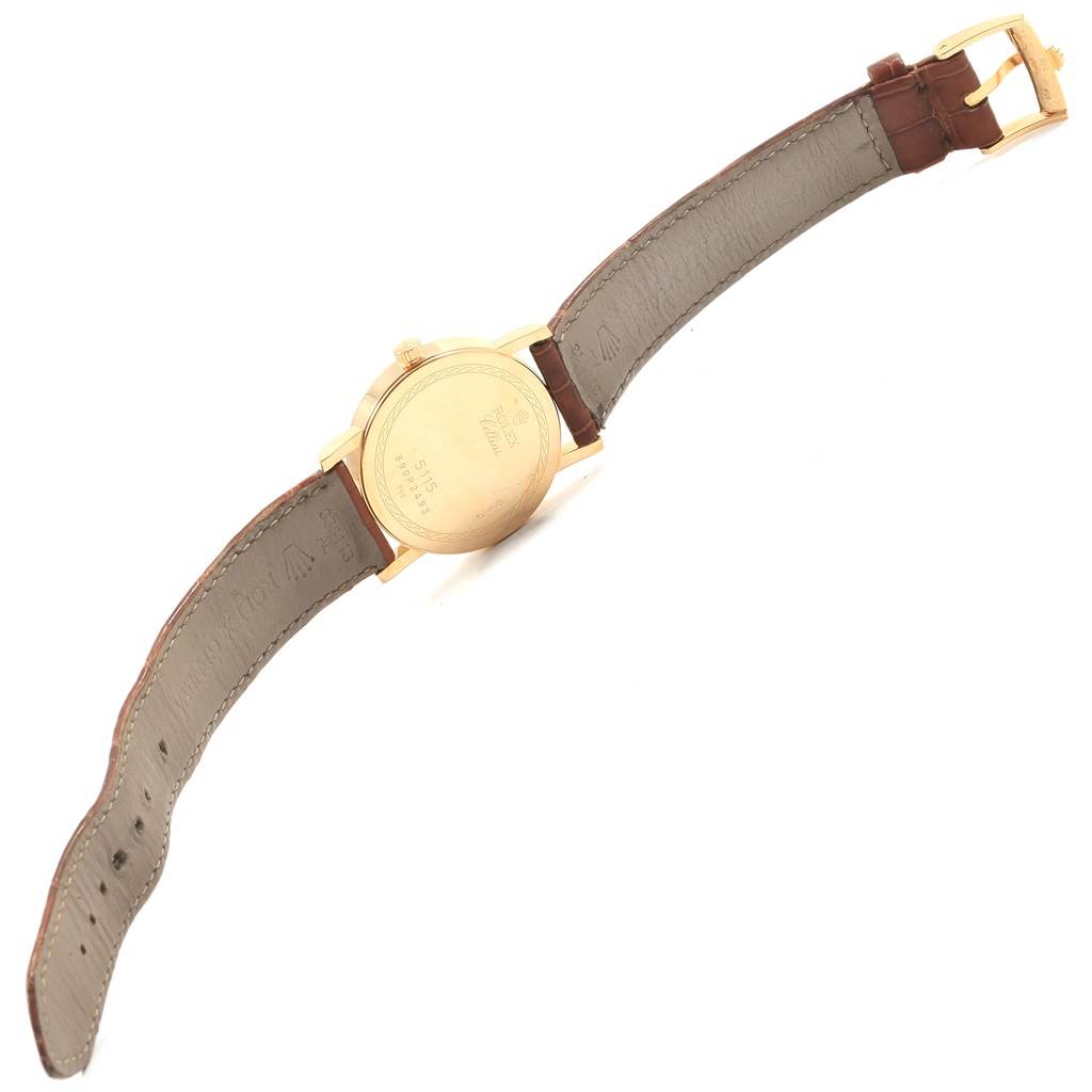 This Rolex Cellini 5115 Men's Beige Dial 5115 Men's Beige Dial watch is shown from the back with an open strap, highlighting the case back, strap, and buckle.