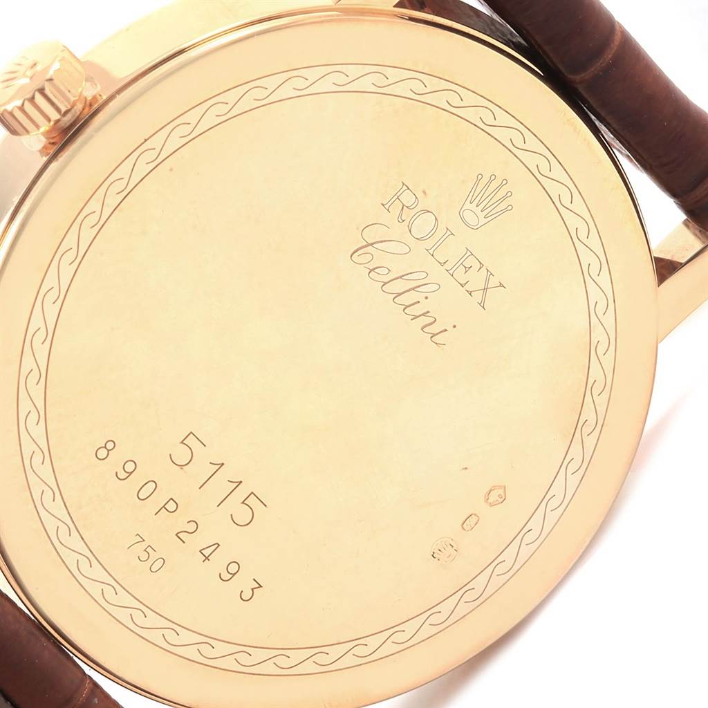 The image shows the case back and part of the crown of a Rolex Cellini 5115 Men's Beige Dial 5115 Men's Beige Dial model watch, featuring its engraved details.