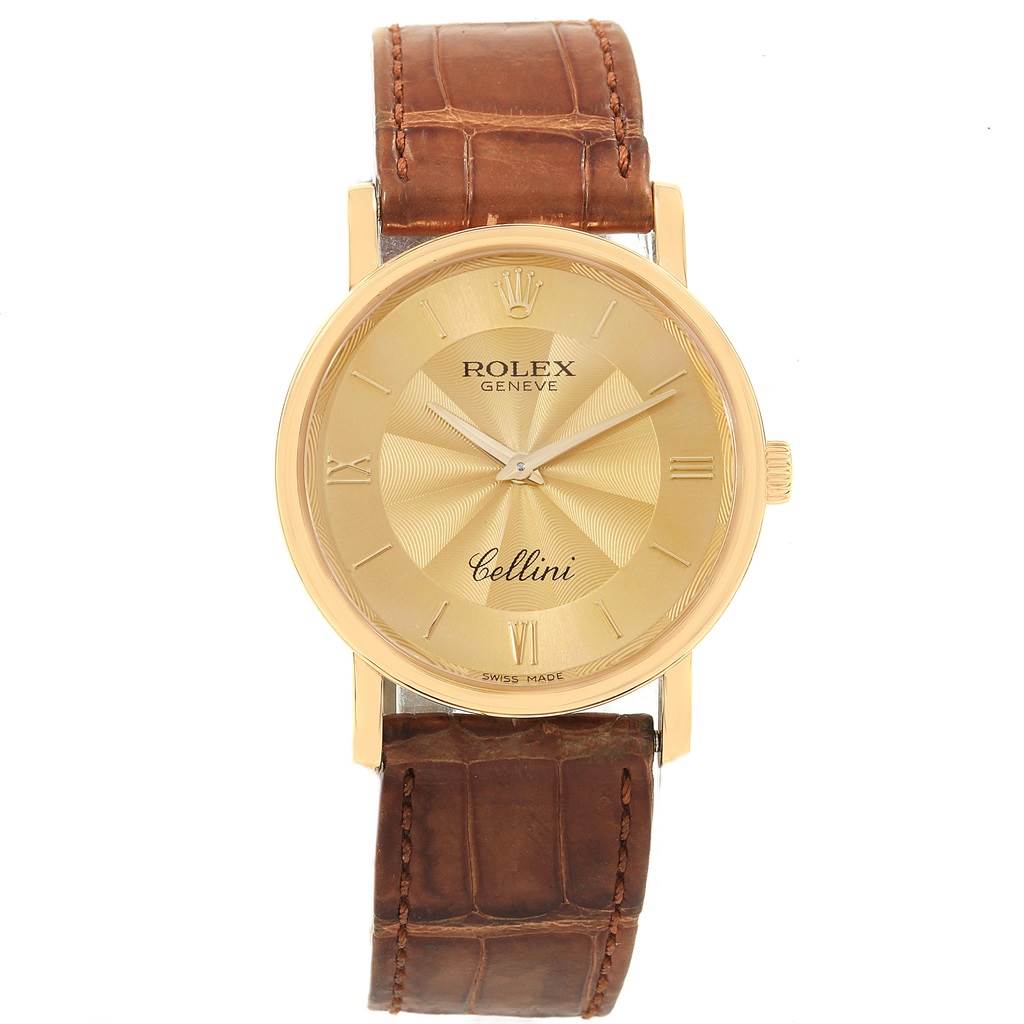 This image shows a front view of the Rolex Cellini 5115 Men
s Yellow Gold Champagne Dial 5115 Men
s Yellow Gold Champagne Dial watch, highlighting its gold dial, brown leather strap, and Roman numeral indices.