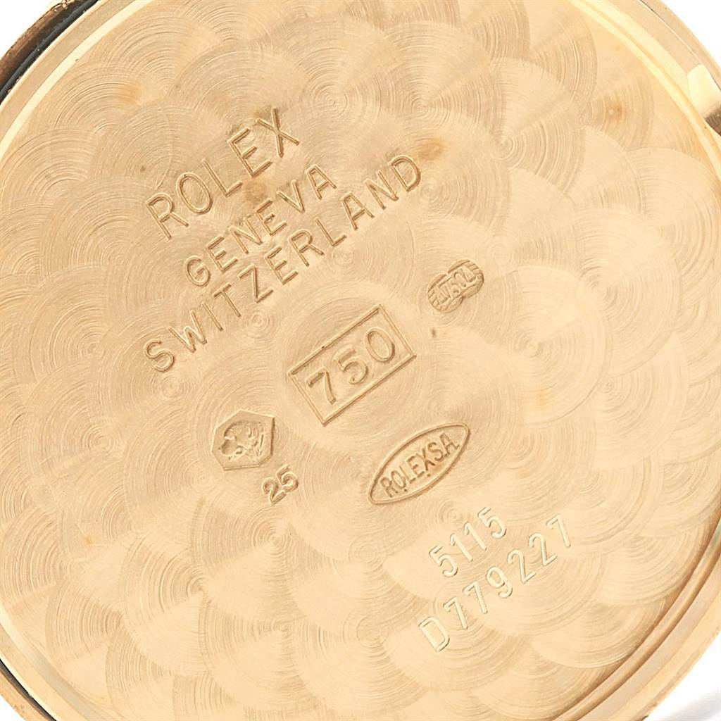 This image shows the interior inscription of a Rolex Cellini 5115 Men
s Yellow Gold Champagne Dial 5115 Men
s Yellow Gold Champagne Dial watch case back from a close-up angle.