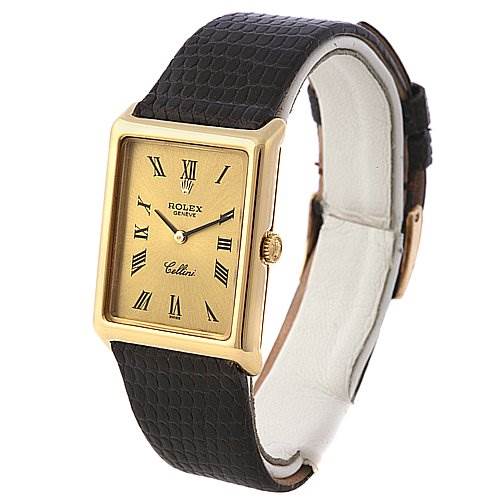 This is a Rolex Cellini 4105 Men's Yellow Gold Champagne Dial 4105 Men's Yellow Gold Champagne Dial watch shown at a three-quarter angle, displaying its gold case, Roman numeral dial, and leather strap.