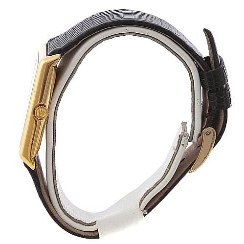 The image shows a side view of a Rolex Cellini 4105 Men's Yellow Gold Champagne Dial 4105 Men's Yellow Gold Champagne Dial watch, highlighting its gold case and black leather strap.