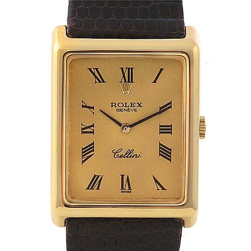 The image shows a front view of a Rolex Cellini 4105 Men's Yellow Gold Champagne Dial 4105 Men's Yellow Gold Champagne Dial watch, displaying its rectangular gold face, Roman numerals, and leather strap.