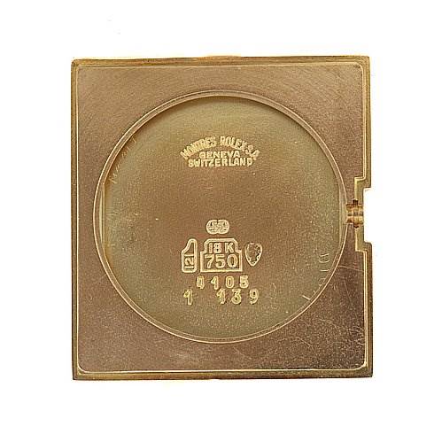 This image shows the inside of the case back of a Rolex Cellini 4105 Men's Yellow Gold Champagne Dial 4105 Men's Yellow Gold Champagne Dial watch, highlighting the gold markings and manufacturer's stamps.