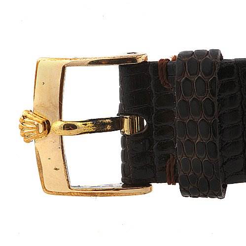 The image shows a close-up view of the buckle and leather strap of a Rolex Cellini 4105 Men's Yellow Gold Champagne Dial 4105 Men's Yellow Gold Champagne Dial watch.