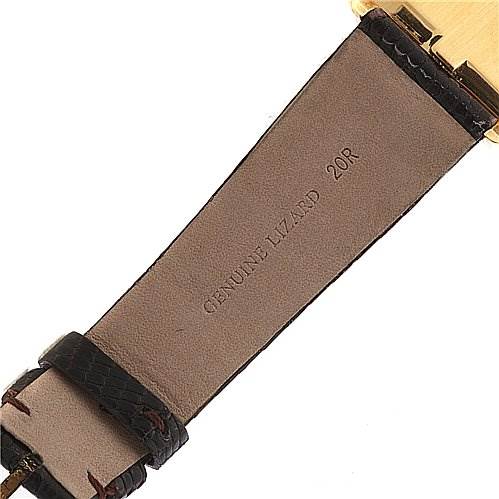 The image shows the interior side of the leather strap of a Rolex Cellini 4105 Men's Yellow Gold Champagne Dial 4105 Men's Yellow Gold Champagne Dial watch, highlighting the "GENUINE LIZARD" embossing.