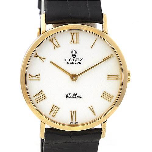 This image shows a front view of a Rolex Cellini 4112 Men's Yellow Gold White Dial 4112 Men's Yellow Gold White Dial watch, highlighting its gold Roman numeral markers and black leather strap.
