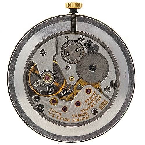 This image shows the internal mechanism of a Rolex Cellini 4112 Men's Yellow Gold White Dial 4112 Men's Yellow Gold White Dial model watch, highlighting its intricate gears and components from a top-down view.