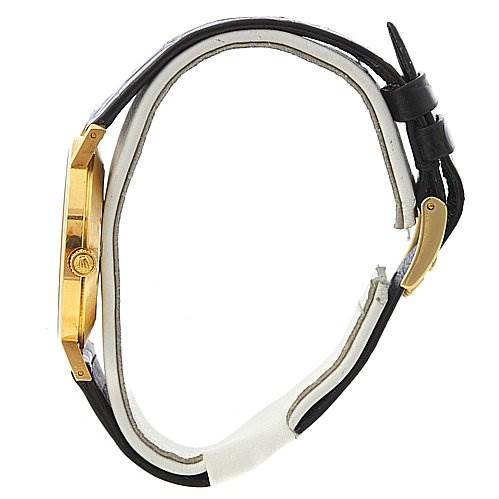 This image shows a side view of a Rolex Cellini 4112 Men's Yellow Gold Champagne Dial 4112 Men's Yellow Gold Champagne Dial watch, highlighting its gold case, crown, and black leather strap.