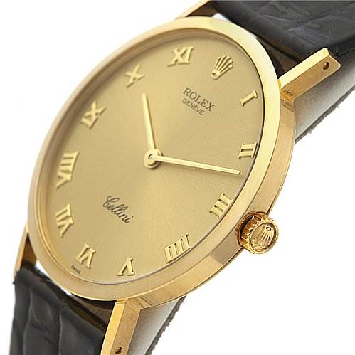 The image shows a close-up of the Rolex Cellini 4112 Men's Yellow Gold Champagne Dial 4112 Men's Yellow Gold Champagne Dial watch face and side, highlighting the gold case, Roman numeral markers, and crown.
