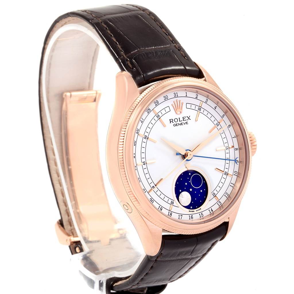 The Rolex Cellini 50535 Men's Rose Gold White Dial 50535 Men's Rose Gold White Dial watch is shown at a three-quarter angle, highlighting its round dial, moon phase display, and leather strap.