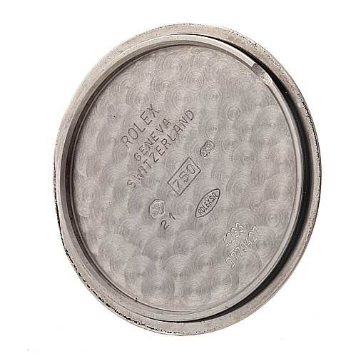 This image shows the inside case back of a Rolex Cellini 4233 Men's White Gold Black Dial 4233 Men's White Gold Black Dial watch, displaying manufacturer engravings and hallmarks.